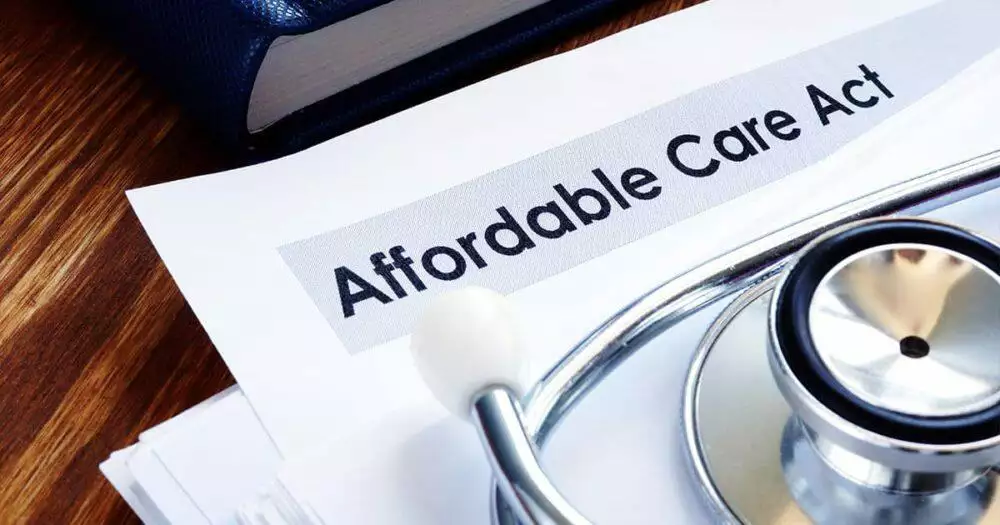 Affordable Care Act Guide Book on a table