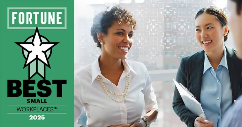A diverse group of people smiling, dressed in various shirts, celebrating their recognition as one of the Fortune Best Small Workplaces for 2025. The image appears to be a screenshot of a poster or announcement.